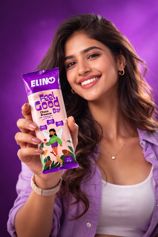 Model holding Elino Choco Brownie protein bar